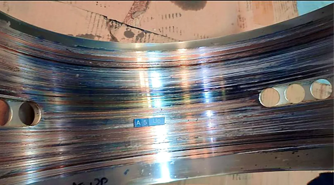 Bearing bore and oil-feed holes inspected after failure